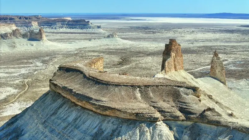 Dramatic canyon formations and red rock landscapes perfect for desert exploration in Mangystau