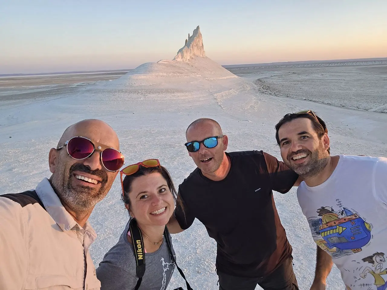 Happy Italian travelers on Mangystau 4x4 tour